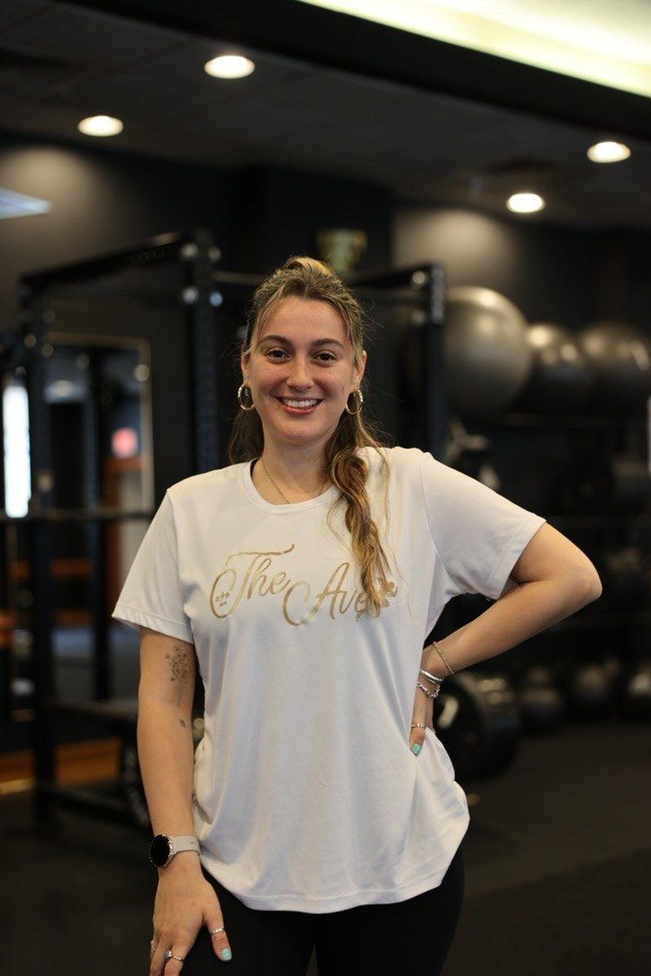 Camila smiling at The Ave training facility